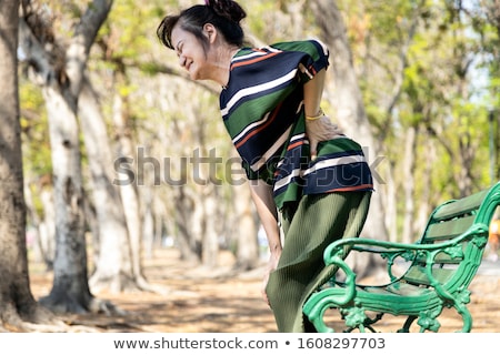Zdjęcia stock: Senior Woman Suffering From Backache Outdoors