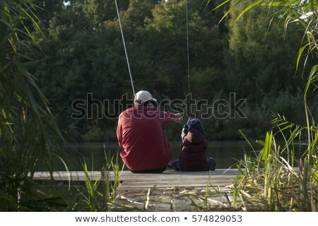 Сток-фото: Cool Dad And Son Fishing On Lake