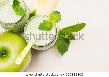[[stock_photo]]: Decorative Border Of Green Apple Fruit Smoothie In Glass Jars With Straw Mint Leaves Cut Apples T