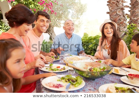 Stock fotó: Family Cooking Meal Outdoors