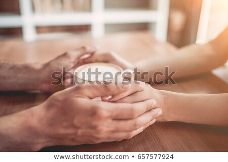 Foto d'archivio: Crop Loving Man And Woman With Coffee