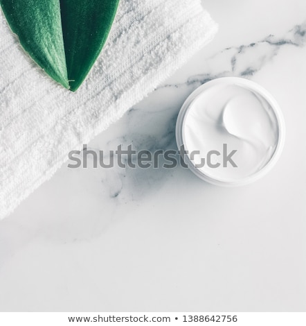 Foto d'archivio: Make Up And Cosmetics Products On Marble Flatlay Background