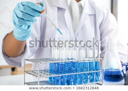 Сток-фото: Scientist Working With Test Tubes