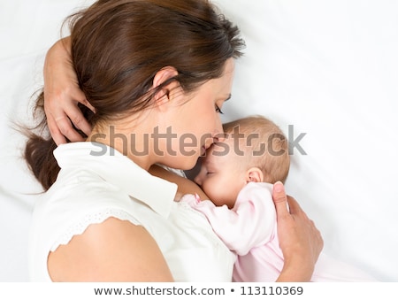 Stock fotó: Happy Mother Breast Feeding Her Baby Infant