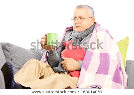 Сток-фото: Senior Man Shivering In The Cold Isolated On White Background