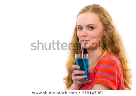 Stok fotoğraf: Dutch Teenage Girl Drinks Blue Soft Drink