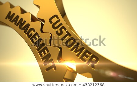 Foto stock: Customer Management On Golden Cogwheels