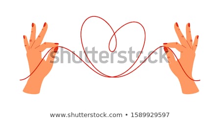 Stock photo: In A Female Hand Tangle Of Rope