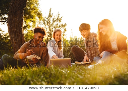 Zdjęcia stock: Group Of Happy Multhiethnic Students Doing Homework