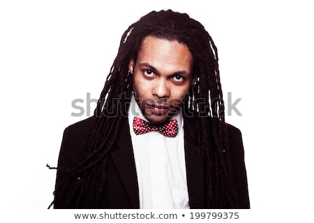 Foto stock: Jamaican Man Wearing Suit And Sunglasses And Bow