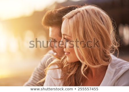 Stok fotoğraf: Attractive Young Couple Cuddling At The Beach Close Up