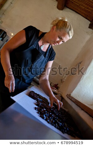 Stock photo: Woman Sorting Praline