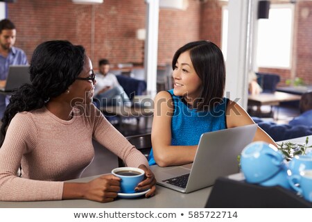 Stok fotoğraf: Two Businesswomen And Two Businessmen