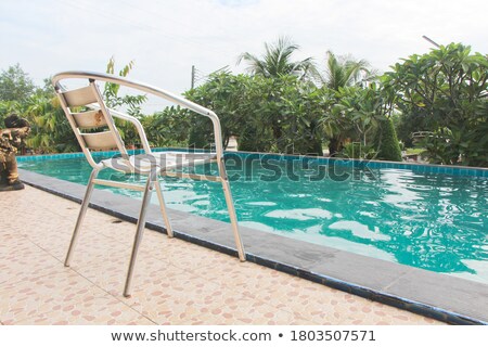 Stockfoto: Poolside Deck Chairs Detail In Tropical Resort