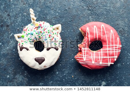 Stockfoto: Cream Cake With A Missing Bite Over White