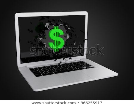 Foto stock: Green Dollar Sign Destroy Laptop