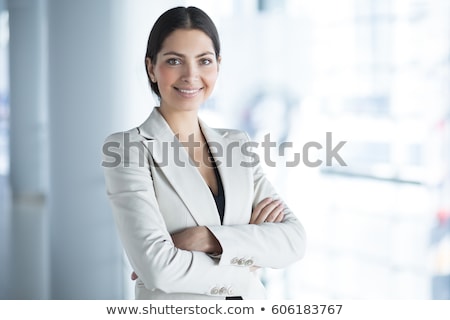 Stockfoto: Caucasian Business Woman Standing With Folded Arms