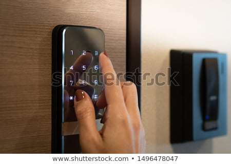 ストックフォト: Hand Touching Control Keypad