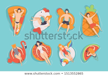 Zdjęcia stock: Woman Lying On Air Mattress In The Swimming Pool