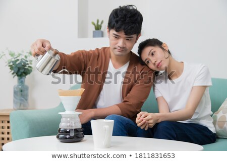 ストックフォト: Young Woman Brewing Coffee With Hot Water