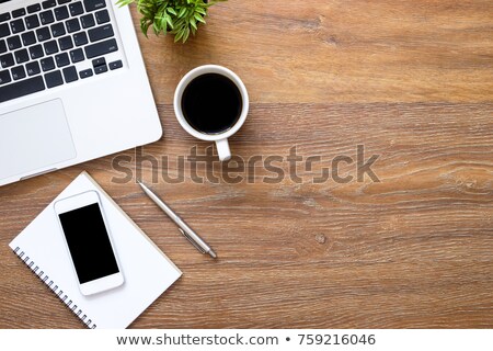 [[stock_photo]]: Flat Layout Of Notebook With Pen With Smartphone Laptop And Photocamera Near By