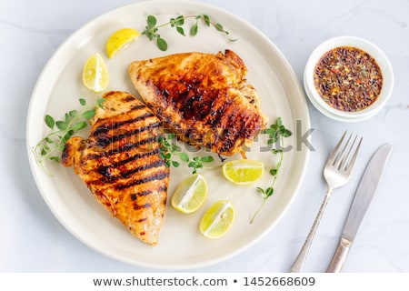 Stockfoto: Grilled Chicken On Serving Plate