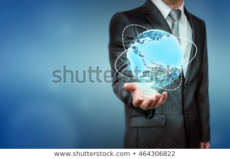 Stock photo: Man Holding The World In The Palm Of His Hand