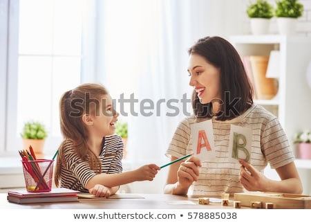 Stock photo: Writing The Alphabet On A Teacher