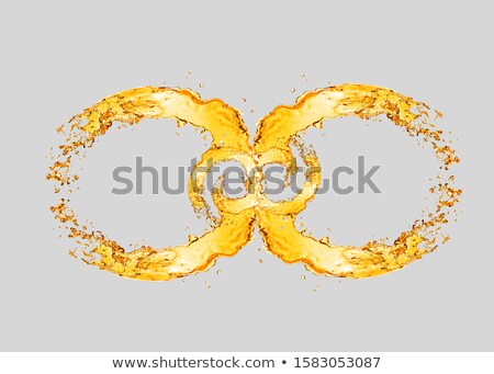 Stock photo: Infinity Sign From Splashing Light Beer
