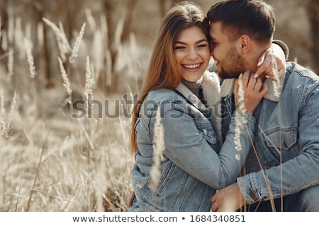 Foto stock: Young Romantic Couple In A Park