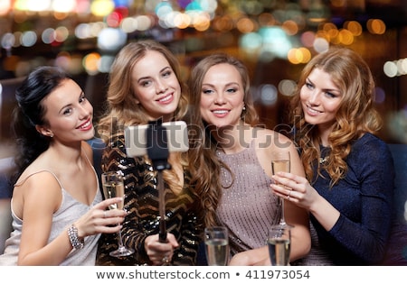 ストックフォト: Women Taking Picture By Selfie Stick At Wine Bar