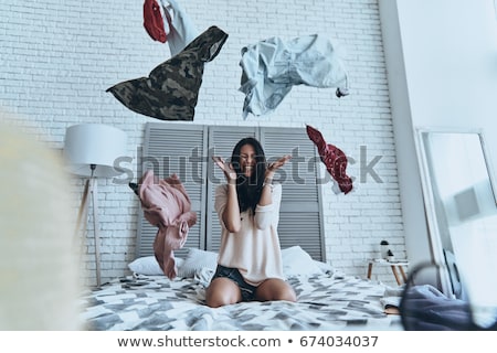 Zdjęcia stock: Throwing Clothes