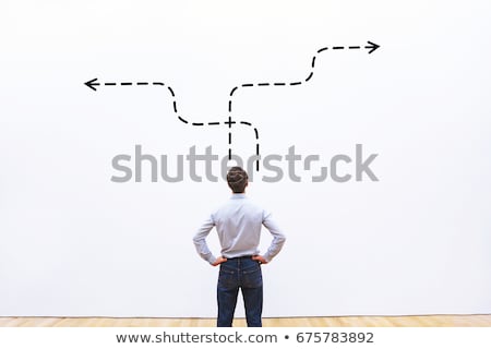 [[stock_photo]]: Manager In Doubt Looking To A Wall With Business Concept