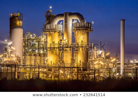 [[stock_photo]]: Detail Of An Industrial Building At Night