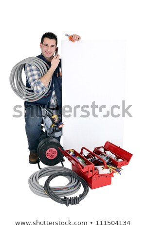 Stock fotó: Tradesman Posing With A Blank Sign