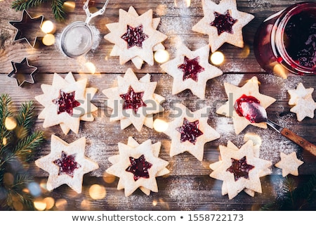 Stockfoto: Christmas Cookies Decorated With Jam On The White Background