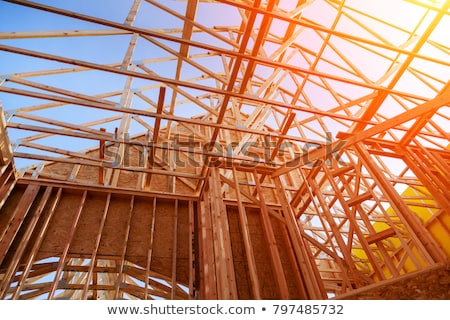 Stok fotoğraf: New Home Construction Framed With Wood Studs