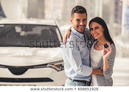 Stockfoto: Woman Holding Car Keys And Contract