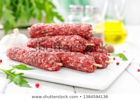 Stockfoto: Shish Kebab On Skewers And Raw Meat