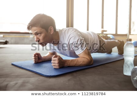 Stok fotoğraf: Muscular Man Planking Crossfit Training