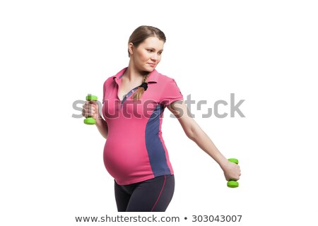 Foto stock: Pregnant Woman Making Exercise With Dumb Bells