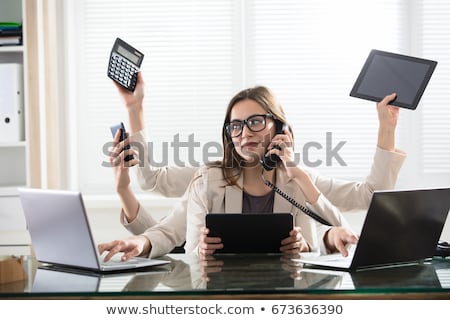 [[stock_photo]]: Young Businesswoman Doing Multitasking Work