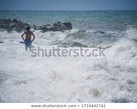 Foto stock: Heavy Waves With White Wave Crest In Storm At The Beach