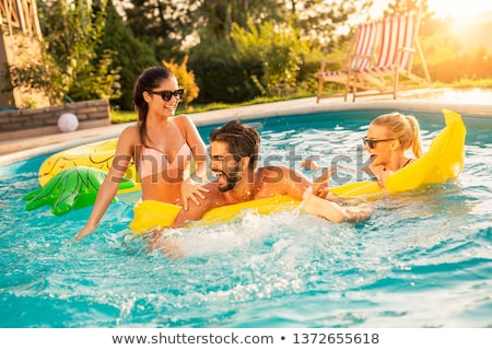 Сток-фото: Girl In Bikini Swimsuit Relaxing In Swimming Pool