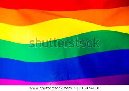 Foto stock: Close Up Of Rainbow Gay Pride Flag Waving Outdoors