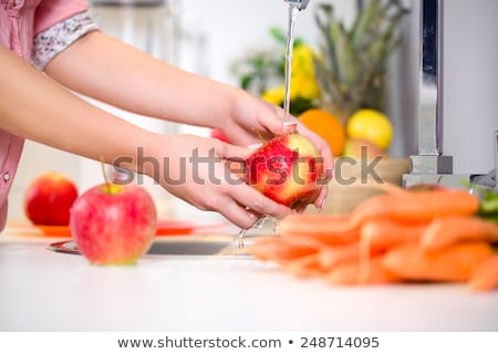 [[stock_photo]]: Apple With Water Tap