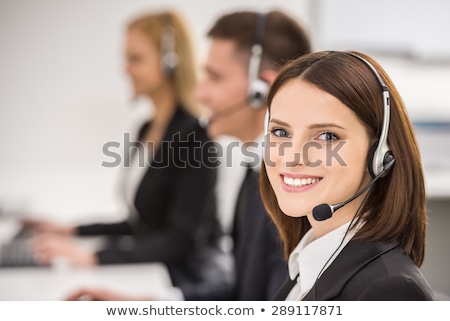 Foto stock: Portrait Of A Beautiful Customer Representative In An Office Environment