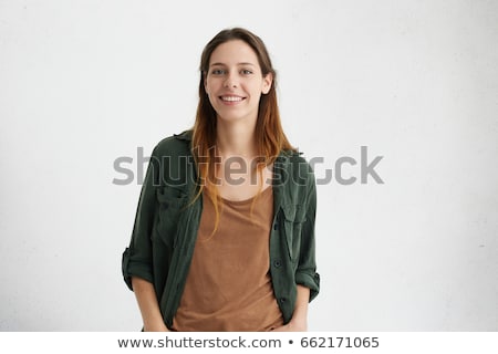 Stok fotoğraf: Portrait Of The Girl With Green Eyes By The Concrete Wall