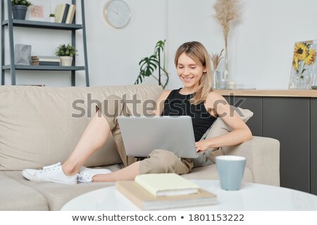 Beautiful Young Blond Woman On The Bed At Home Stock photo © Pressmaster