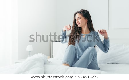 Stock fotó: Serene Woman Waking Up In Her Bedroom